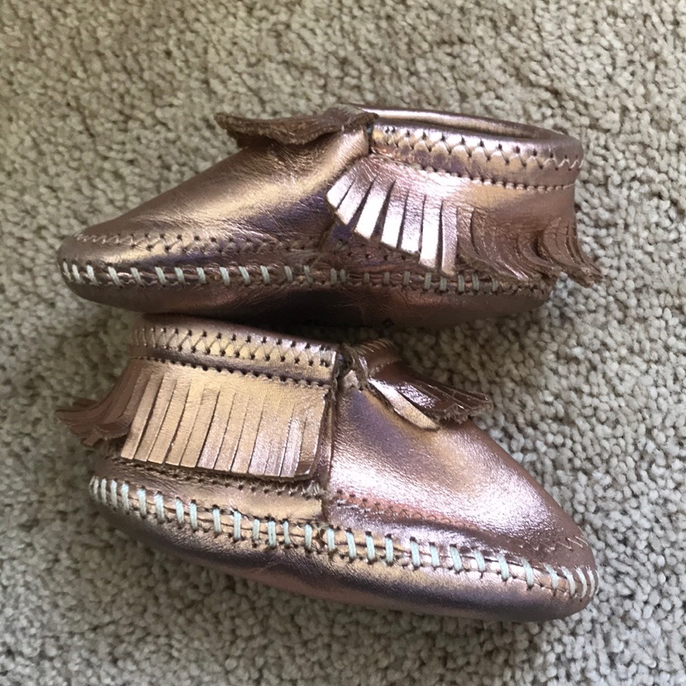 Copper Minnetonka leather moccasins size 3